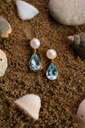 Cultured South Sea Pearl & Blue Topaz Earrings in gold-tone metal with natural blue topaz and cultured South Sea pearls