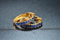 Sapphire Half-Eternity Hoop Earrings in gold-tone metal with natural sapphire
