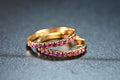 Garnet Half-Eternity Hoop Earrings in gold-tone metal with natural garnet